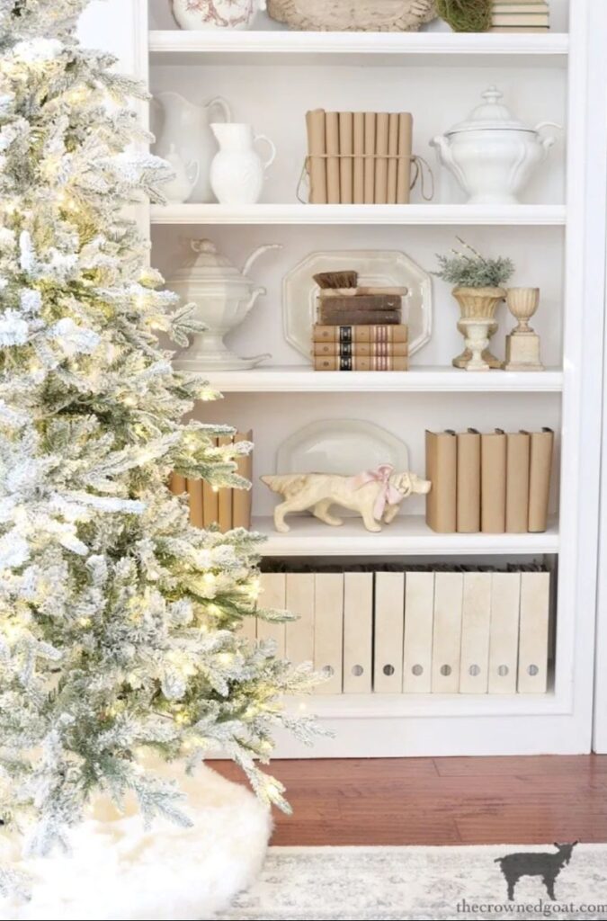 open shelves with winter décor and tree