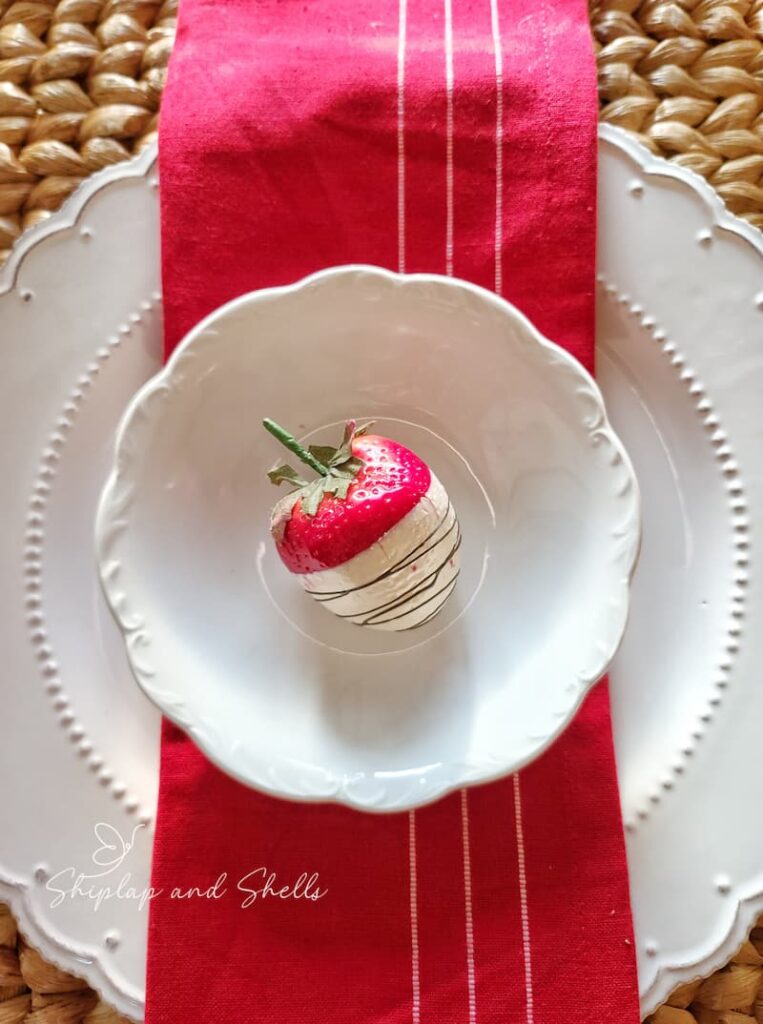 white chocolate covered strawberry in bowl