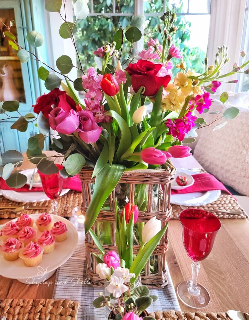 garden inspired Valentine's Day tablescape with vase of flowers