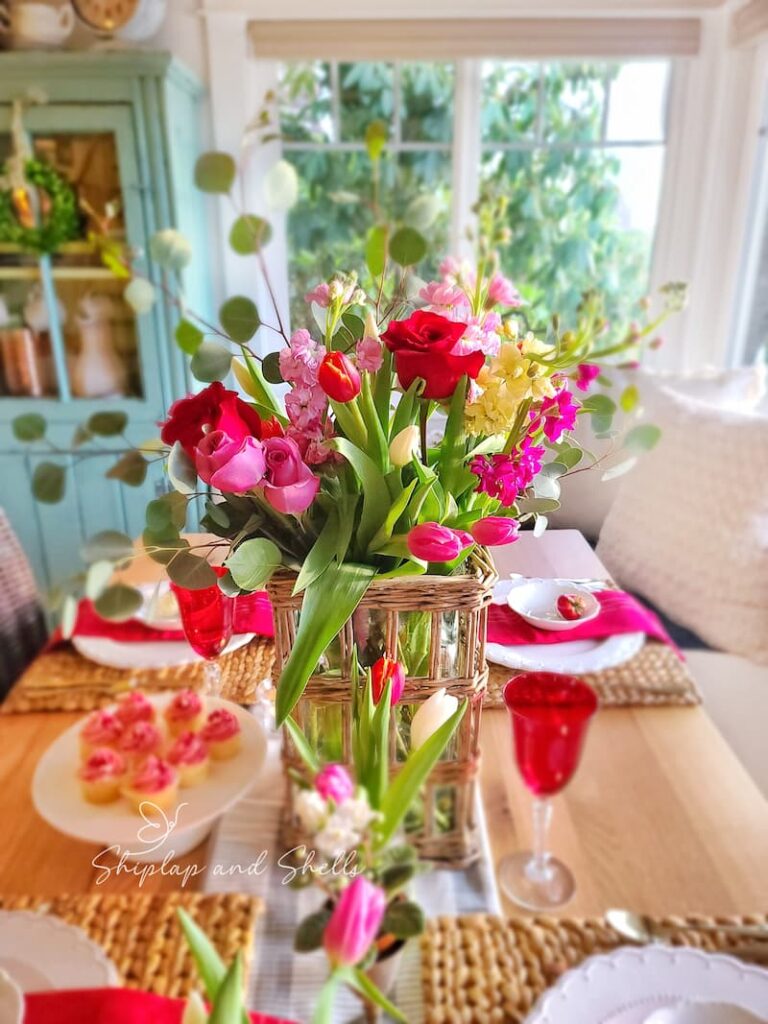 garden inspired Valentine's Day tablescape with vase of flowers