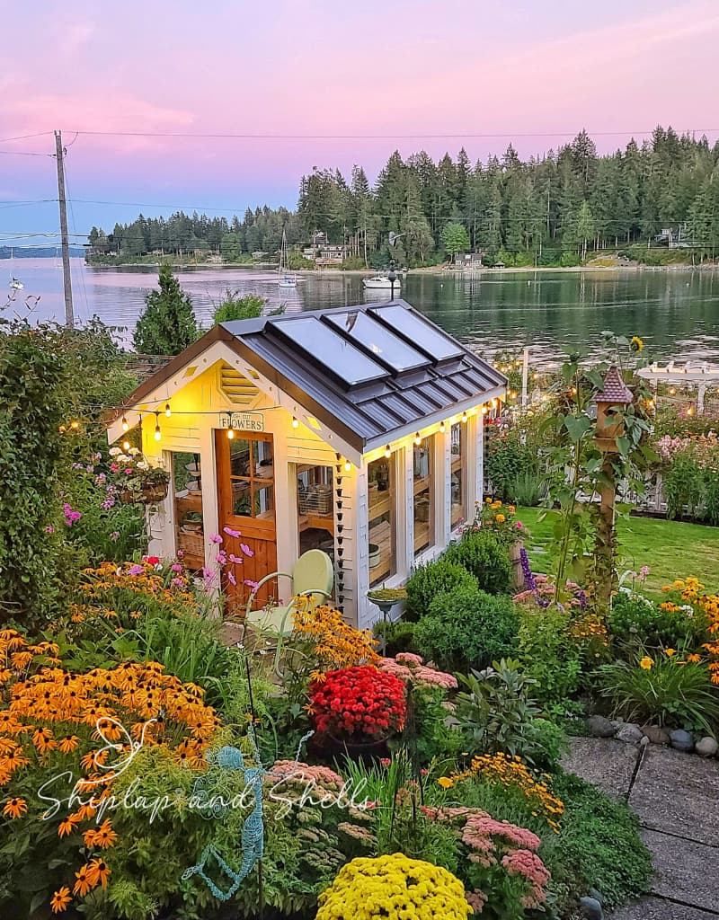 greenhouse and garden in the fall overlooking the water view