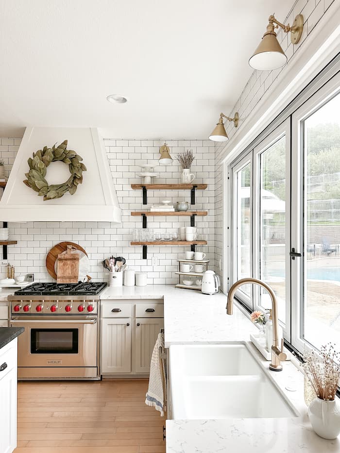 subway tile and open shelving in kitchen