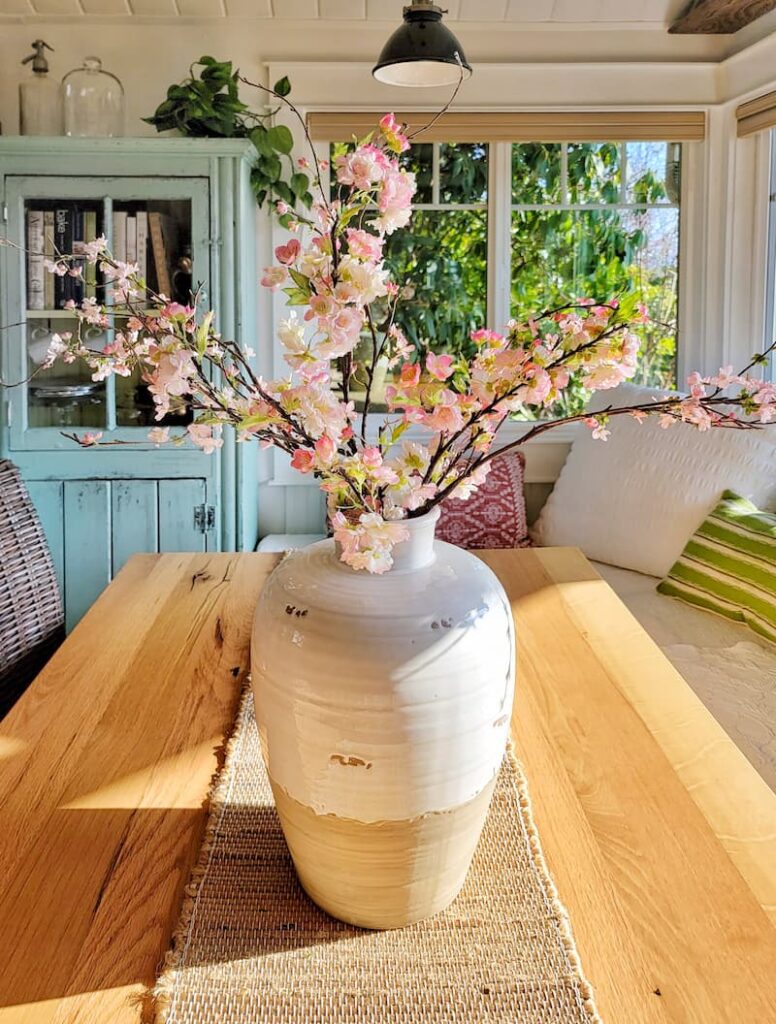 faux spring blossoms in vase