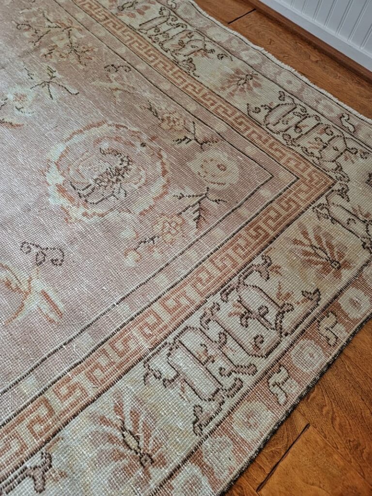 vintage pink and cream patterned rug 