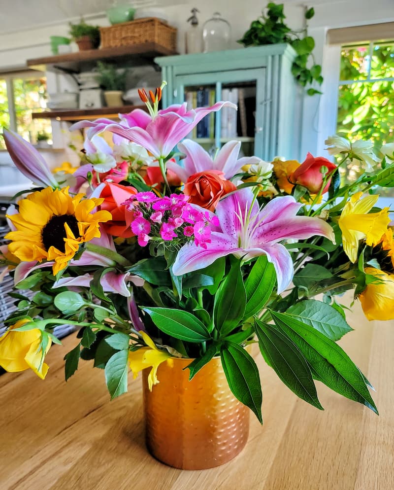 extend the life of cut flowers:  tropical flower arrangement