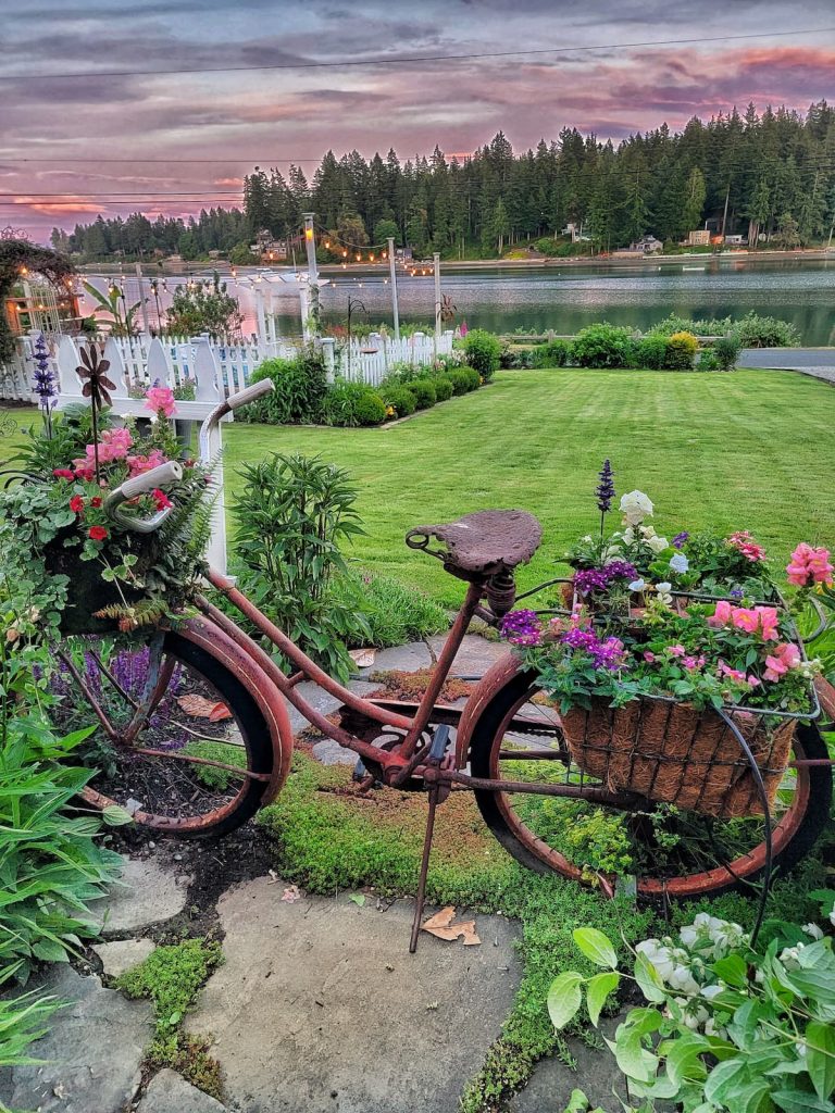 sunset vintage bike with basket full of flowers
