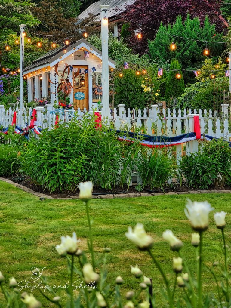 greenhouse and garden decorated for 4th of July