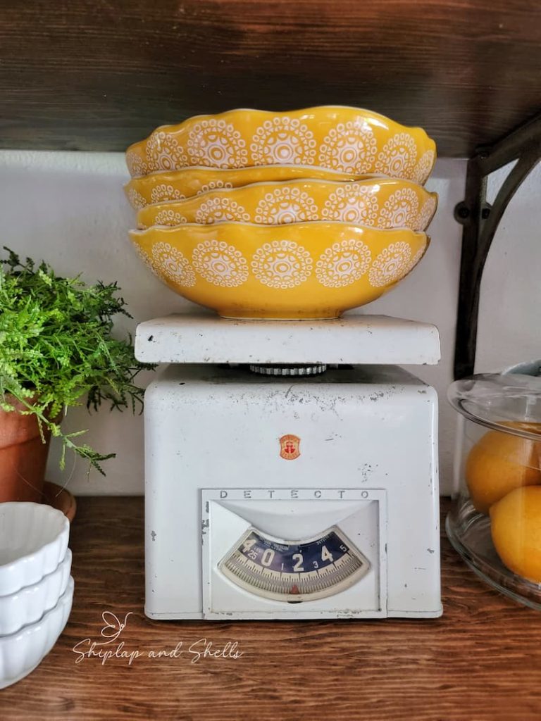 vintage scale and yellow and white patterned bowls