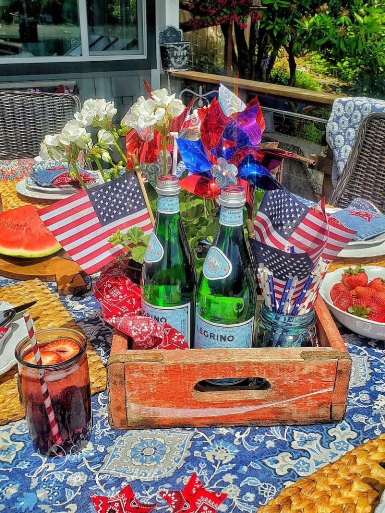 a outdoor dining table with patriotic decor
