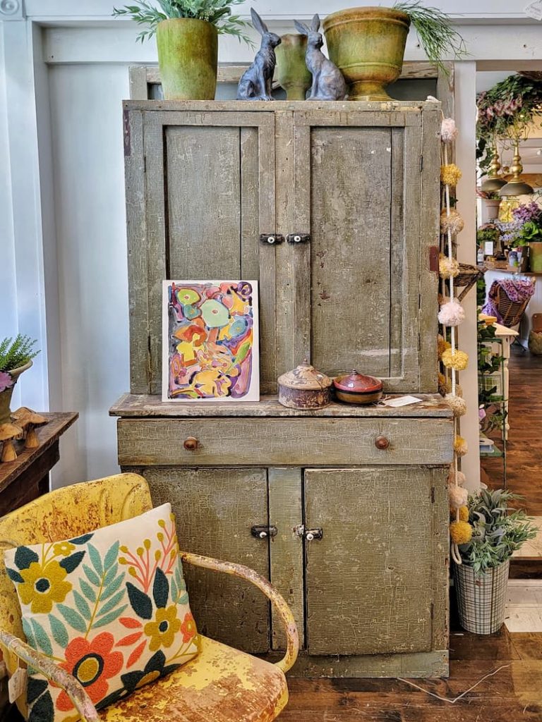 vintage crackle cabinet and yellow vintage chair