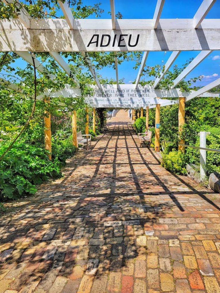 brick pathway with arbor with goodbye message