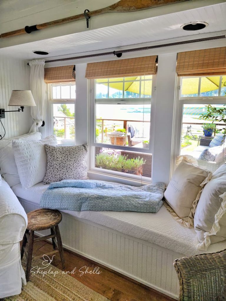 Summer coastal beach cottage living room window seat