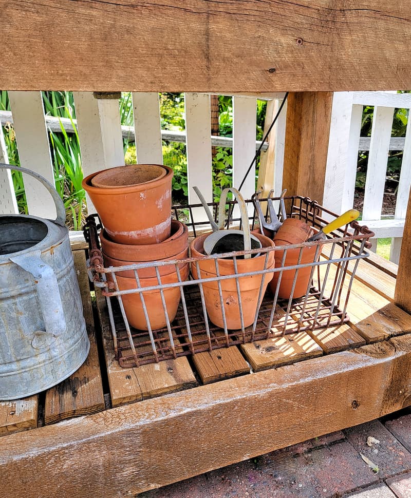 wire basket with terra cotta pots