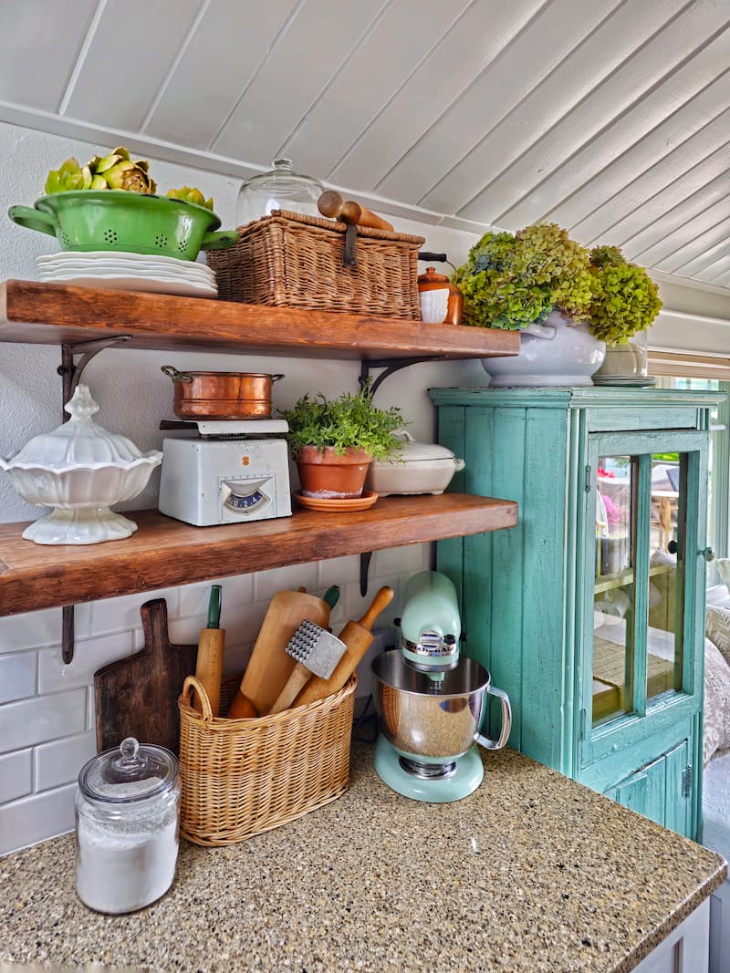 vintage ironstone and copper on kitchen open shelving for fall