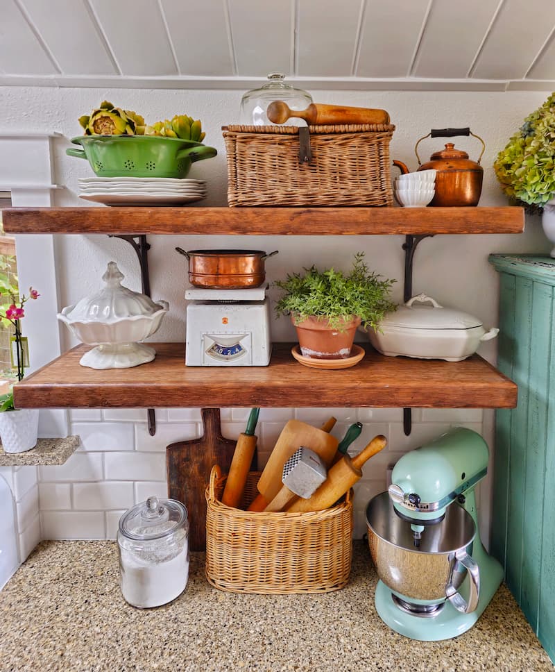 kitchen open shelving with vintage collections displayed