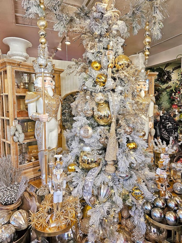 Christmas decor theme: silver and gold ornaments on Christmas tree and nutcrackers