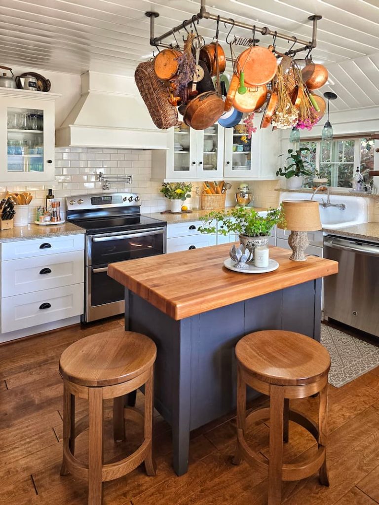 cottage style kitchen with island and butcher block countertop
