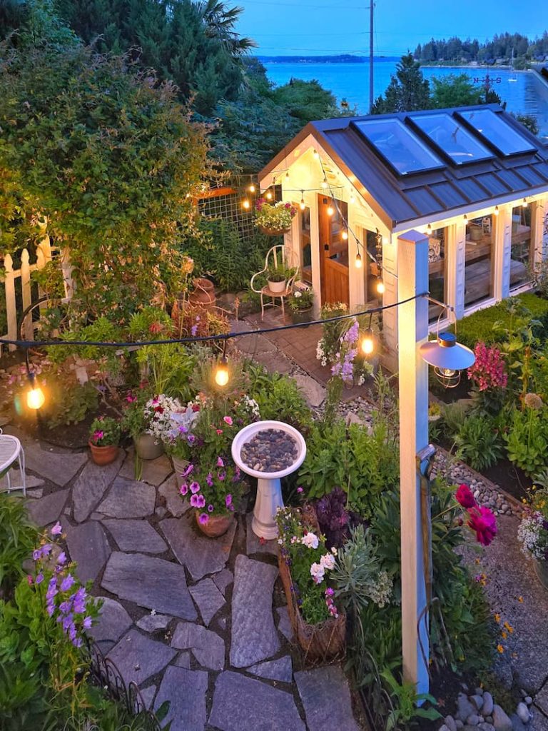 evening view of greenhouse and garden