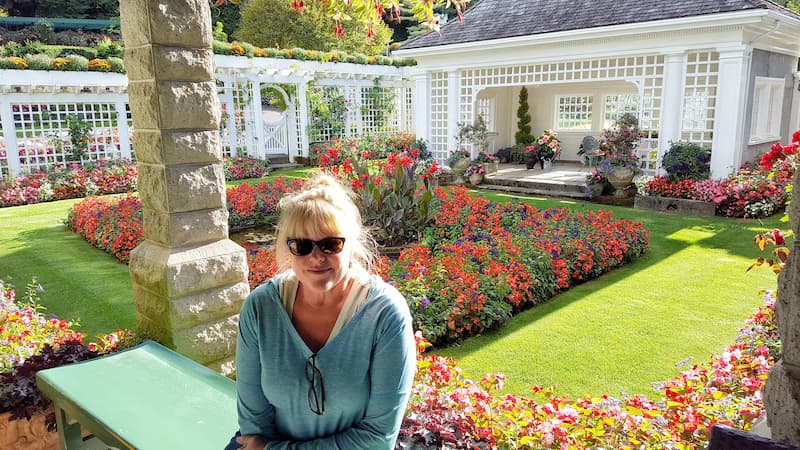 sitting in front of the the Butchart Garden's private garden