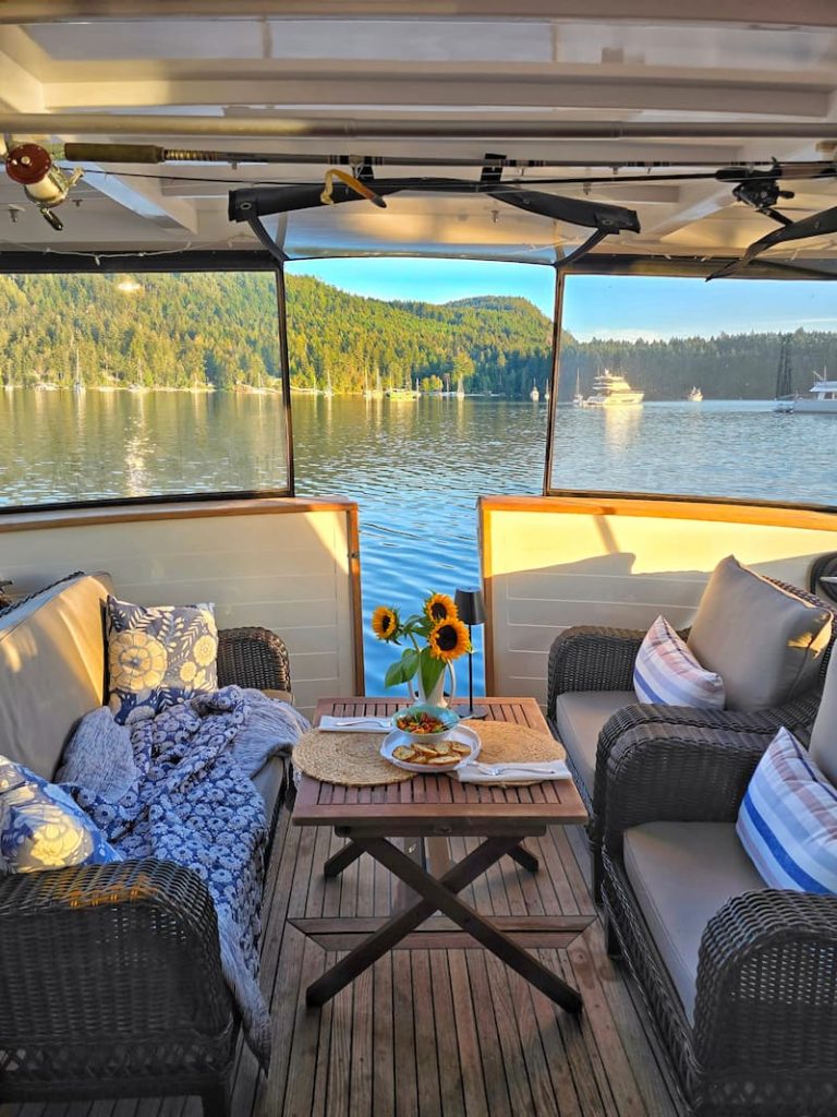 boat cockpit seating with sunflowers on the table