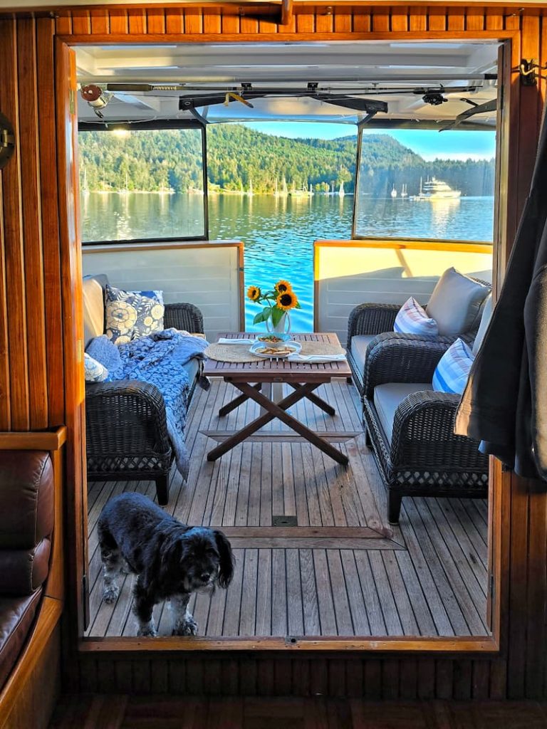 boat cockpit seating with sunflowers on the table