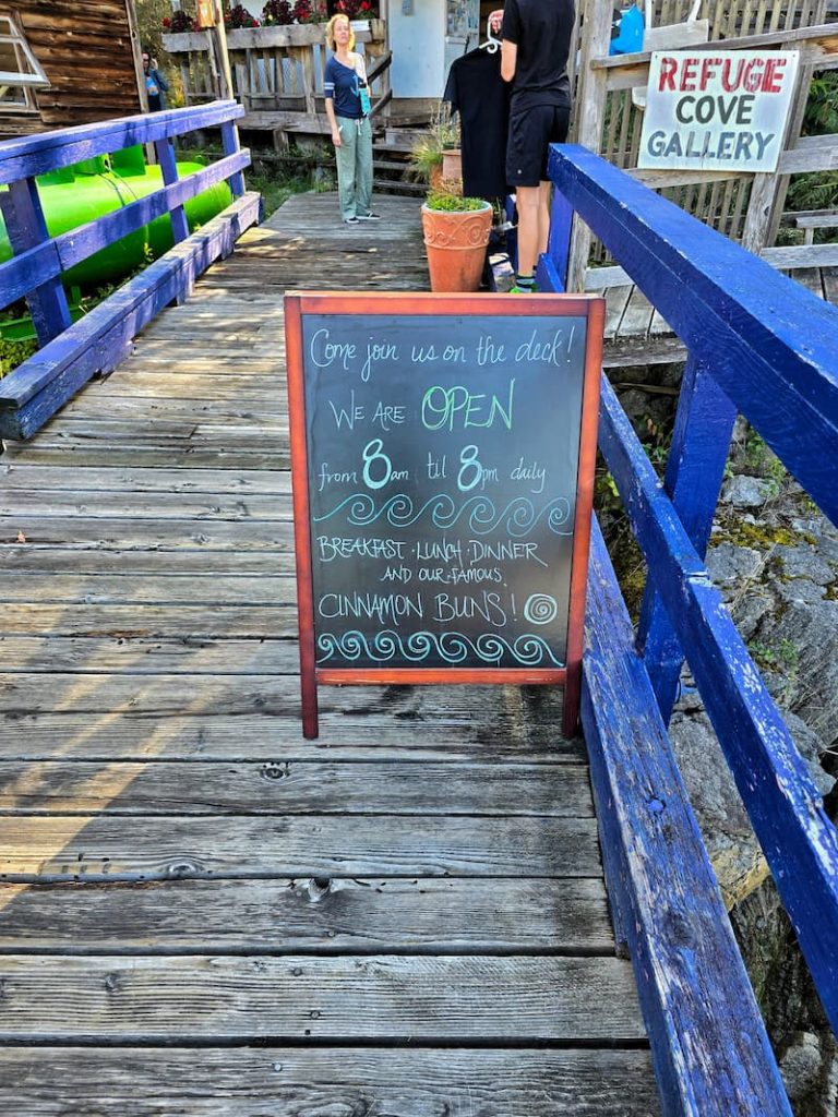 Refuge Cove dock with sign for restaurant