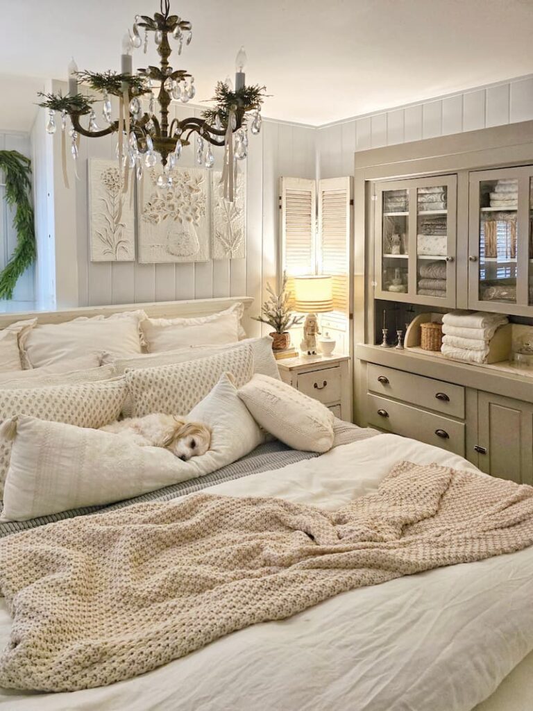 dog sleeping in the cottage bedroom decorated for Christmas