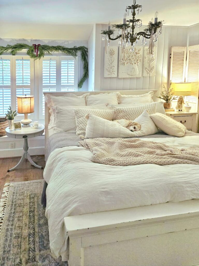 dog sleeping in the cottage bedroom decorated for Christmas