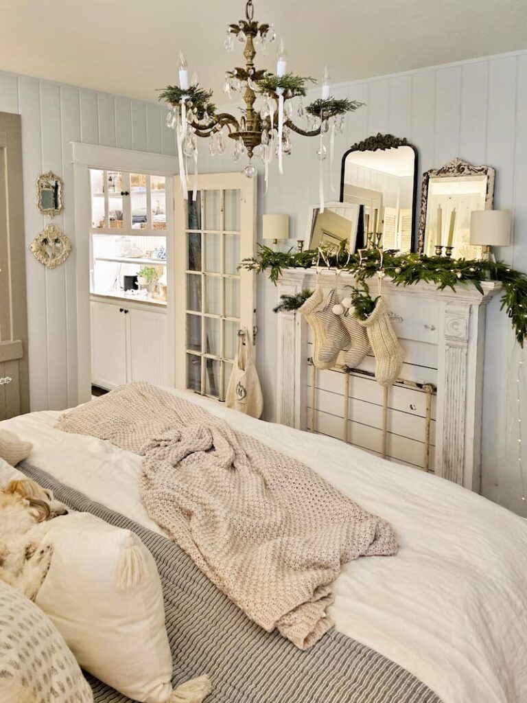 dog sleeping in the cottage bedroom decorated for Christmas