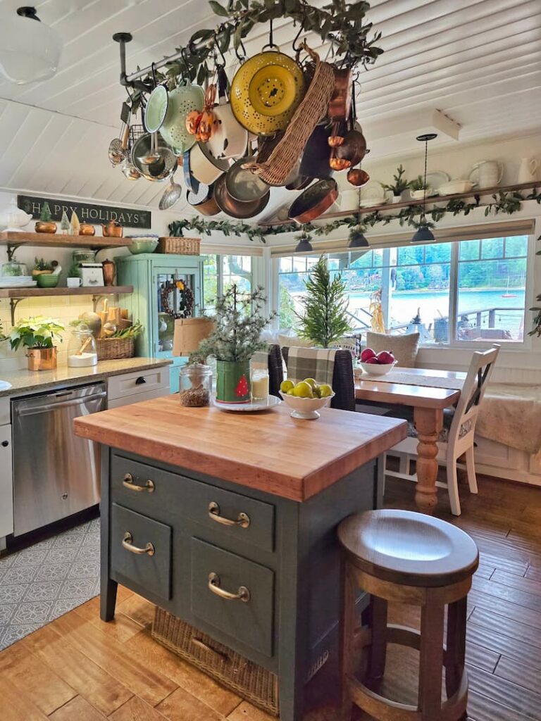 cottage kitchen island and pan rack decorated for Christmas