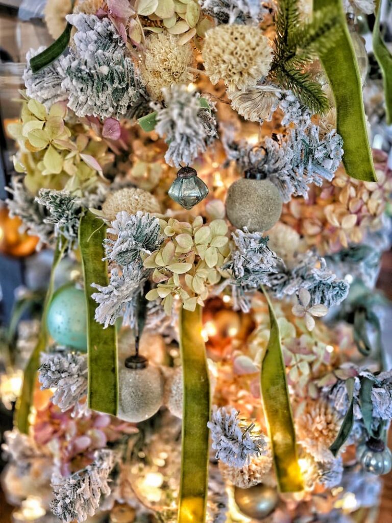 Christmas tree with hydrangeas and ribbon