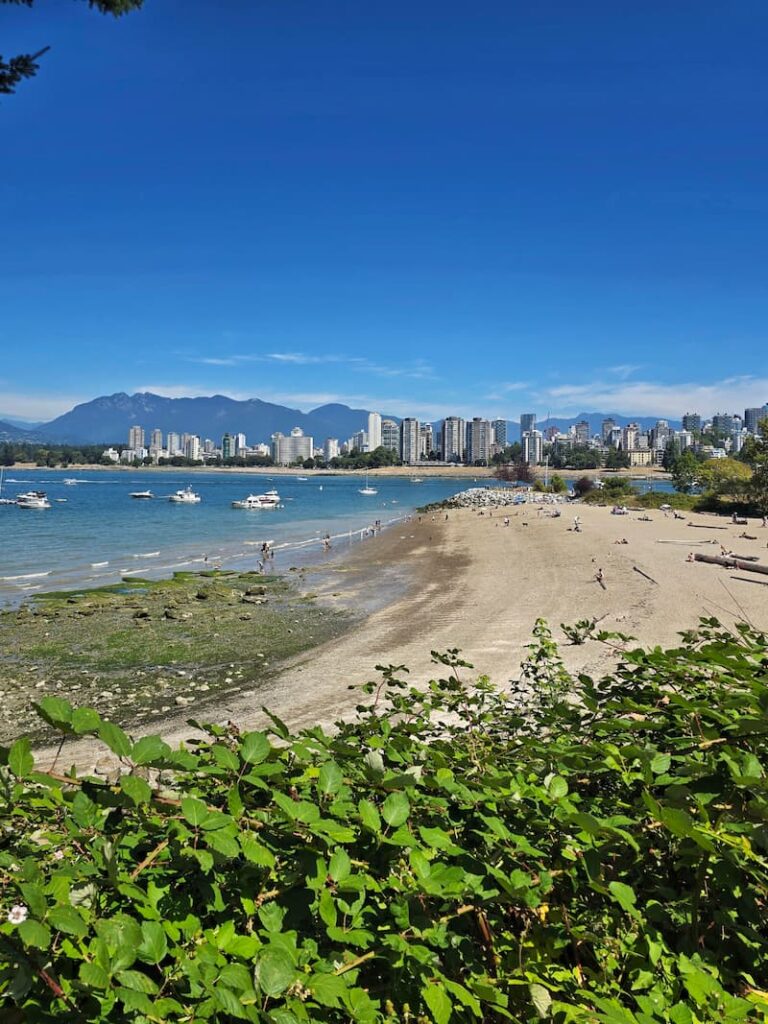 riding bikes on Vancouver trail overlooking beach
