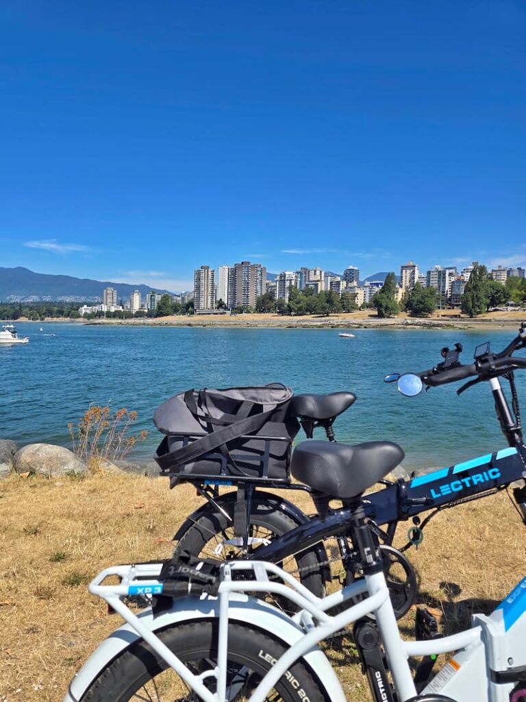 riding bikes on Vancouver trail overlooking beach