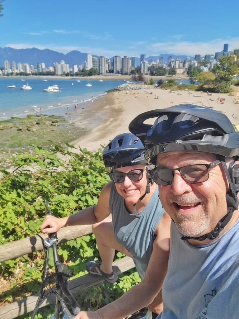 riding bikes on Vancouver trail overlooking beach
