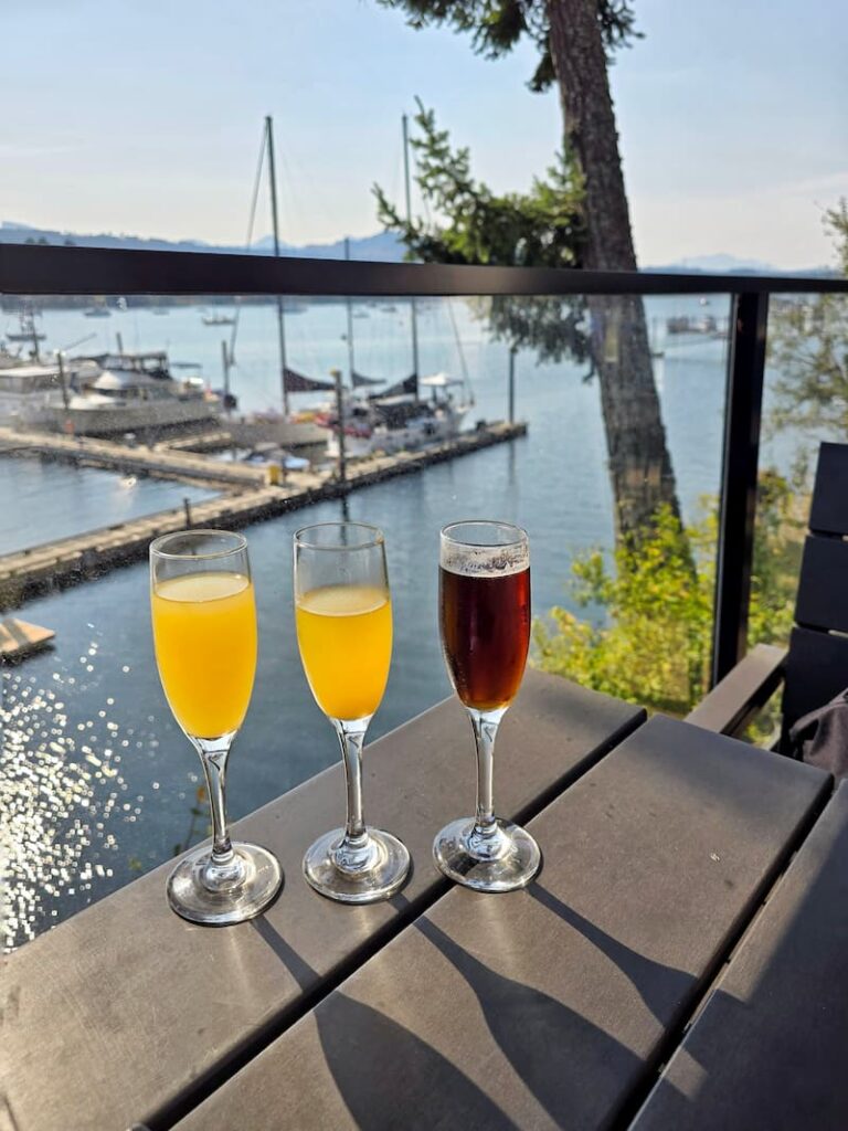 prosecco flights on patio table overlooking the water
