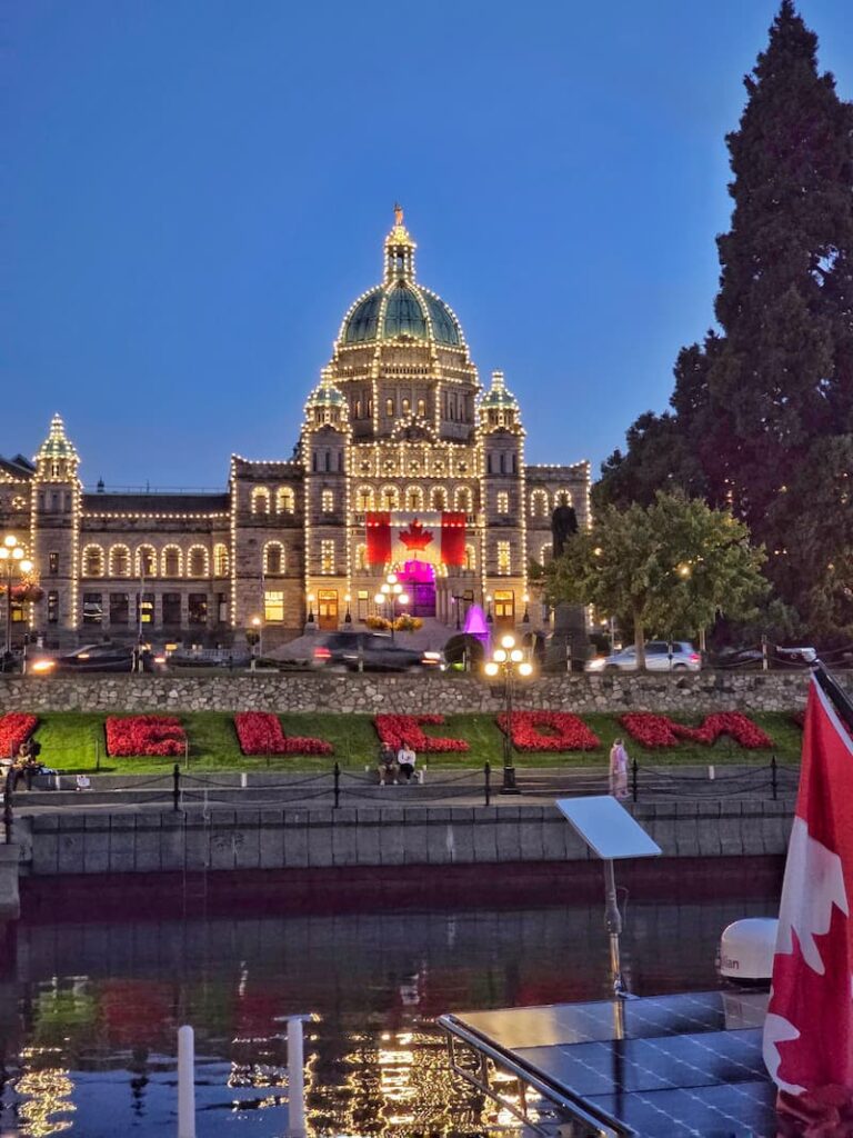 Parliament Building in Victoria lit up in the evening