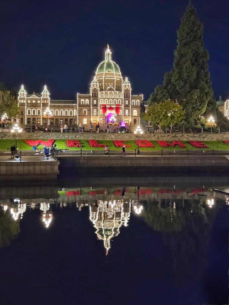 Parliament Building in Victoria lit up in the evening