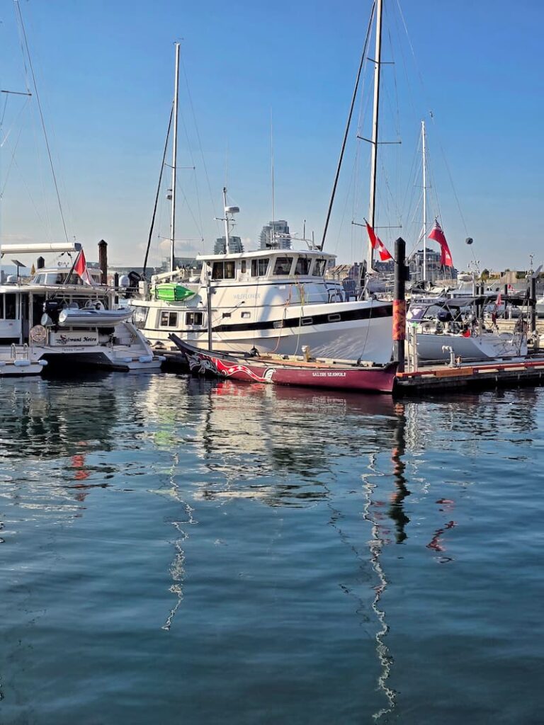 Kadey Krogen Whaleback trawler on the dock of a marina