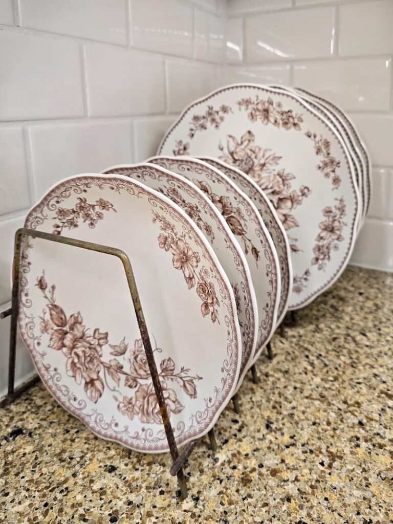 white and brown floral patterned dishware