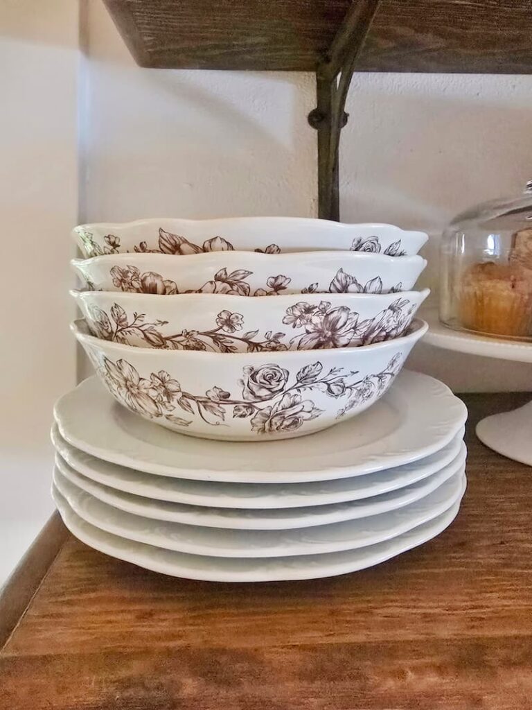 white and brown floral patterned dishware