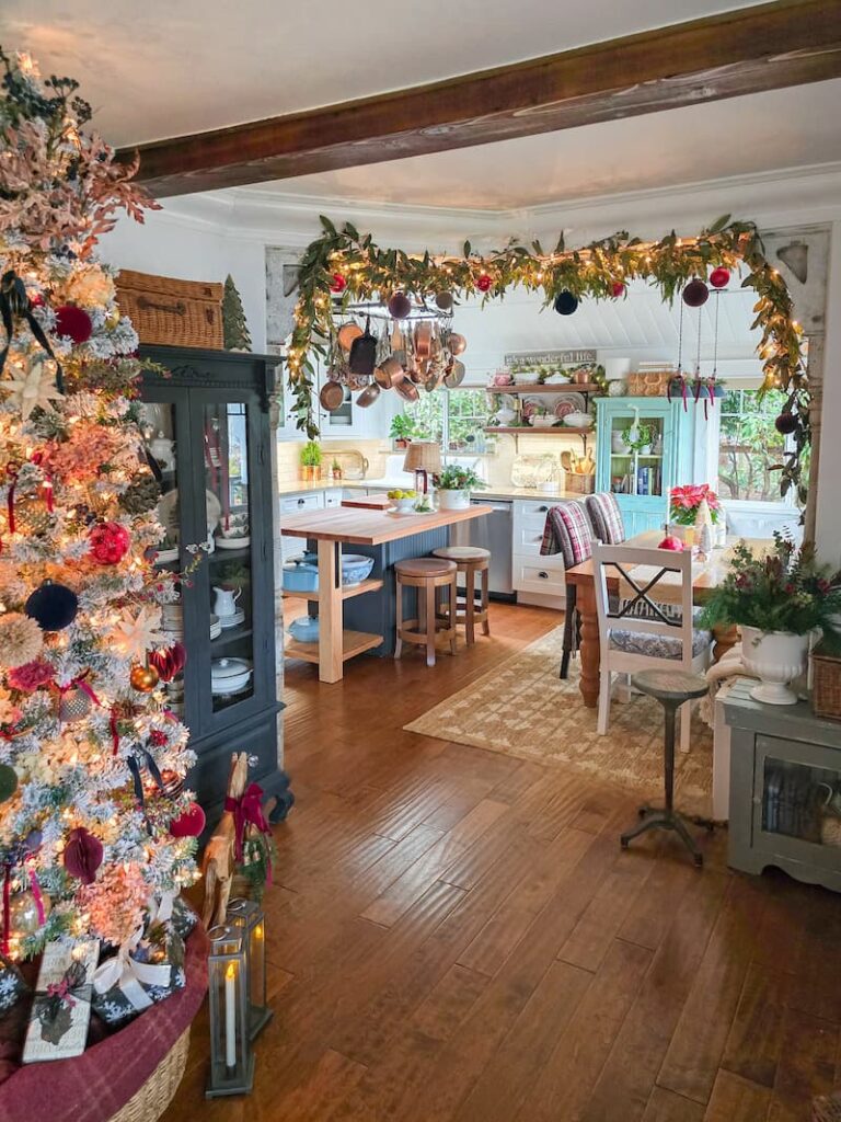 living room and kitchen decorated for Christmas