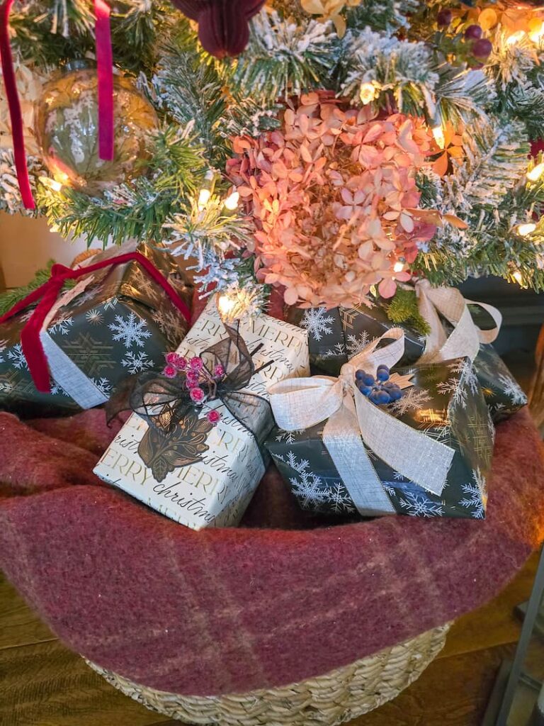 black and cream wrapped gifts under the tree