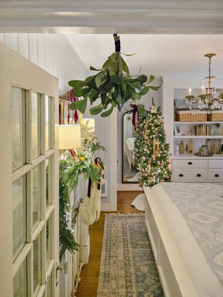 mistletoe hanging in the bedroom doorway