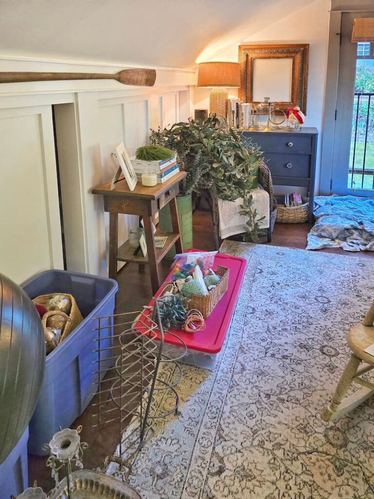 Christmas decoration piles all over the messy room