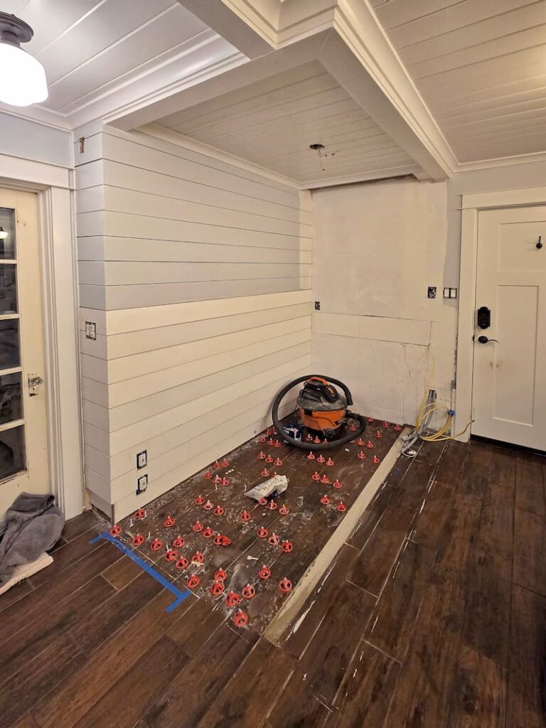 new tile on the floor of the bathroom