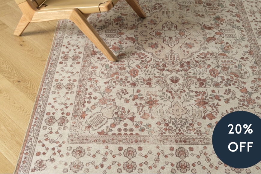 cream and brown patterned rug