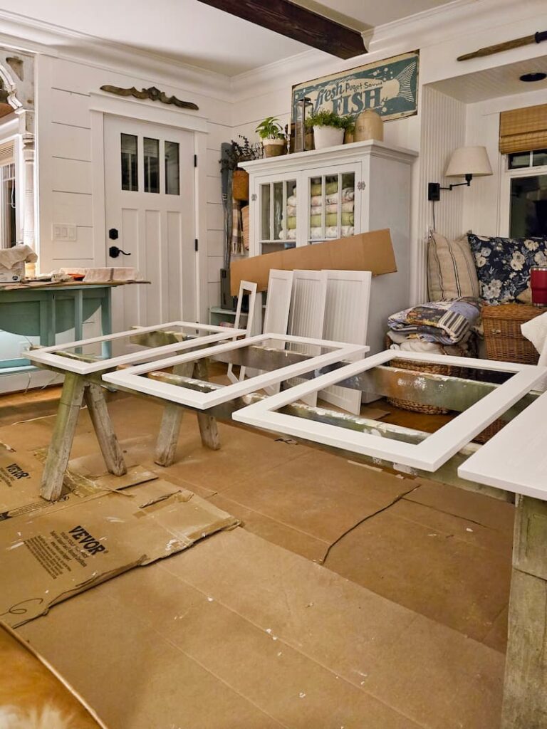 cabinet doors being painted in the living room