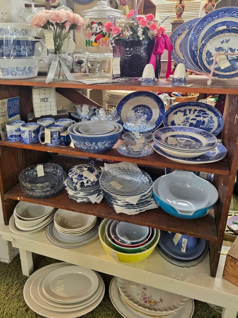 blue and white vintage dish collections on display at store
