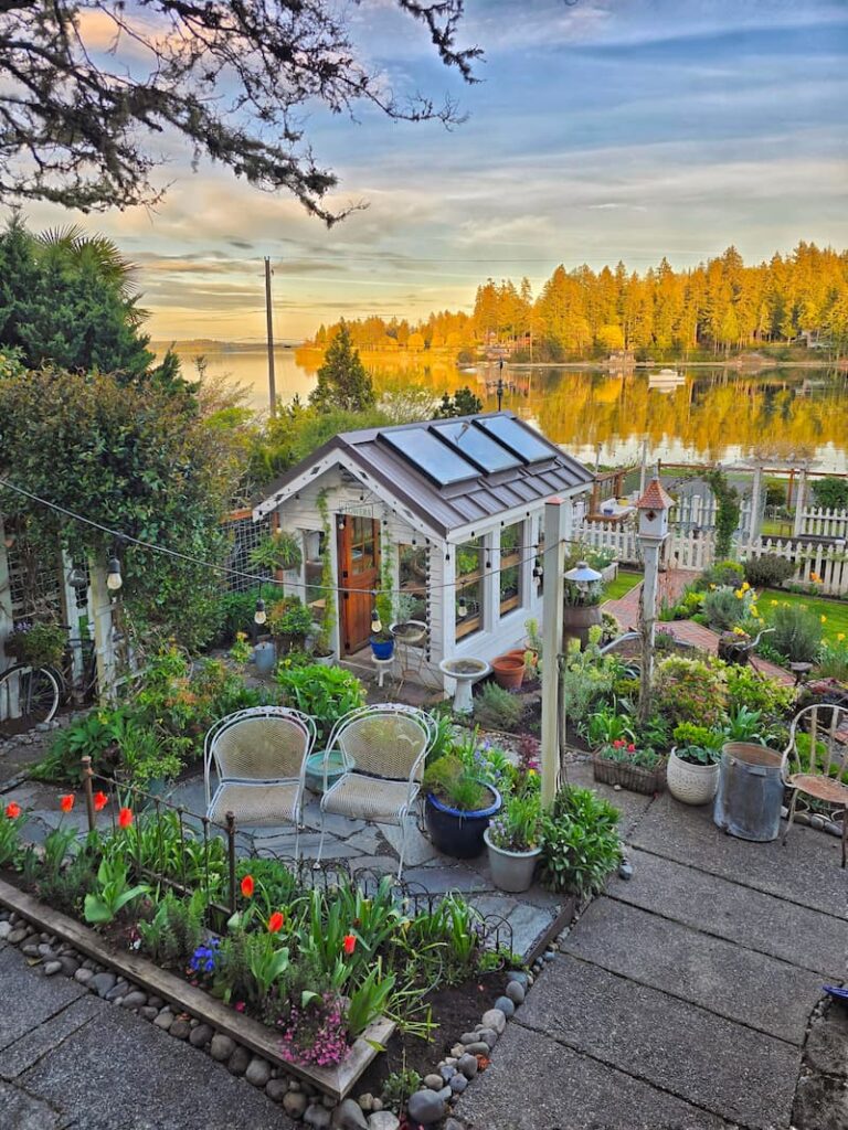 greenhouse and spring cottage garden with bay view