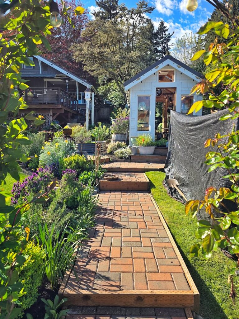 brick paver pathway to the greenhouse